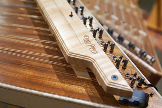 Close-up of a Dusty Strings hammered dulcimer with dampers