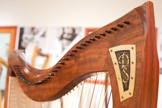 Close-up of a Dusty Strings harp in bubinga