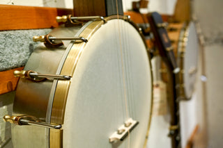 Close-up of a banjo with a focus on the body