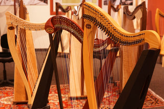 Close-up of a harp with other harps in the background