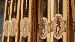 Row of Clarke whistles in boxes