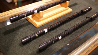 Low pennywhistles in a display case