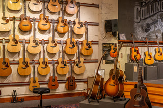 Floor-to-ceiling wall of guitars