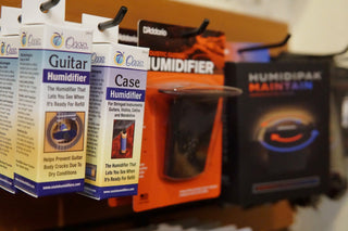 Display of guitar humidifiers and case humidifiers.